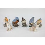 A pair of Kyd porcelain hare salt and pepper, a set of four bird ornaments including a kingfisher,