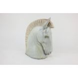 A Lladro Grecian style horse's head bookend, in mottled brown and green glaze, 25cm