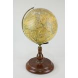 A Philips popular terrestrial globe mounted on wooden stand, 28.5cm high including stand