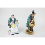 Two Royal Doulton porcelain figures, The Mask Seller HN2103, 22.5cm, and The Rag Doll Seller HN2944,