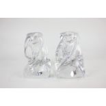 A pair of French Cristallerie Lorraine clear glass candlesticks of swirled form, 13cm high