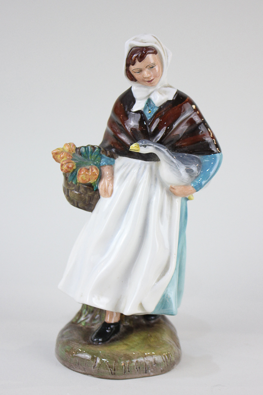 A Royal Doulton porcelain figure of a lady carrying a goose and a basket of flowers, Country Lass