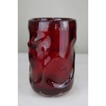 A 20th century ruby red glass vase with knobbly form, 24cm high