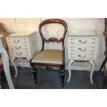 A pair of French style white painted bedside tables with three drawers with gilt metal scroll