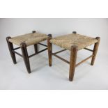 A pair of rush seated rectangular footstools on turned legs with stretchers, 27cm