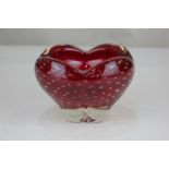 A Whitefriars red glass molar vase with controlled bubble design, designed by Geoffrey Baxter (