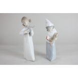 Two Lladro porcelain figures of girls, one holding a chicken, the other with a ukulele