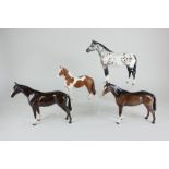 Two Beswick models of horses, including an Appaloosa stallion, colourway No 2, label to hind leg,