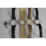 An Anne Klein gold plated lady's diamond wristwatch, together with four other quartz wristwatches