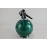 A Globemaster green soda siphon, 27cm