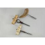 Two bone handled corkscrews and a corkscrew with horn handle (3)