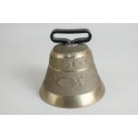 A Swiss brass cowbell stamped Susset A6 Vetendorf Swiss made, 8cm high