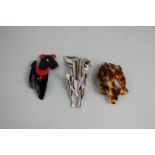 Three Lea Stein plastic brooches modelled as a tortoise, a dog and a fox