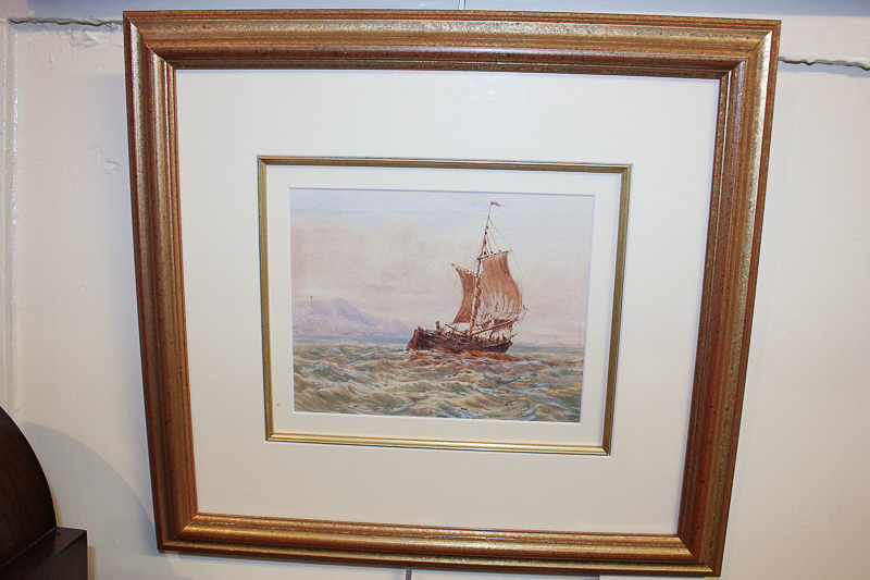 Late 19th / early 20th century school, fishing boat at sea, distant coastline, watercolour,