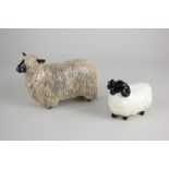 A Beswick model of a Wensleydale sheep, white with black markings, gloss, 10.8cm, and a pottery