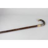 A gilt mounted horn handled walking stick monogrammed ARW 1914