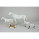 A Beswick model of a horse, grey, gloss, 20cm, together with a Beswick pony, grey, gloss, 13cm,