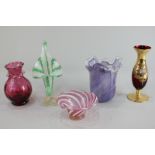 A Venetian lilac glass vase, a green, white and clear glass bud vase with gold inclusions, a pink