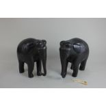 A pair of African carved ebony elephants (a/f), 20cm high