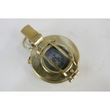 A replica brass compass marked MK IX (B13066) F Barker & Son Ltd, London 1939