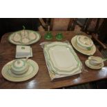 A mixed collection of Art Deco china tableware with cream and green decoration, to include