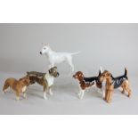 Three Beswick models of dogs comprising a beagle 'Wendover Billy', black, tan and white, gloss, 12.