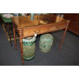 A late 19th century mahogany rectangular side table with two drawers, stamped Gillows, on turned and