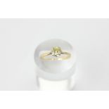 A yellow diamond old cut ring in platinum and 18ct yellow gold