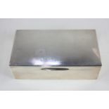 A George VI silver cigarette box with rectangular engine turned lid, Birmingham 1946, 16.5cm