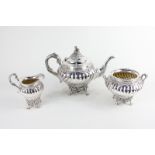 An Edward VII Scottish silver three piece tea set, maker George Edward & Sons, Glasgow 1907, with