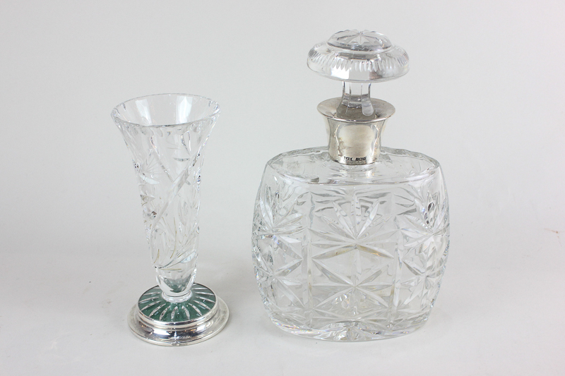 An Elizabeth II silver mounted cut glass decanter, maker S J Rose & Son, Birmingham 1987, together