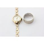 An 18ct white gold wedding ring, and a lady's 9ct gold Regent bracelet watch