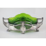 A WMF Art Nouveau oval table centre bowl, twin handled with green glass liner