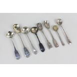 A collection of eight George III and later silver salt, mustard and condiment spoons, with London,