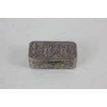 A modern Italian silver pill box with embossed classical design of music and dancing, bearing London