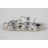 A novelty silver miniature five piece tea set and tray, 15cm, maker P H Vogel, Birmingham 1974