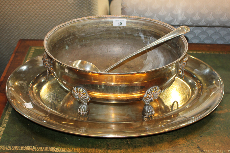 A silver plated oval tureen with lion mask ring handles, raised on cast paw feet, 38cm, a large oval - Image 2 of 2