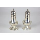 A pair of Edward VII silver peppers, baluster shape, maker William Henry Sparrow, Birmingham 1904,