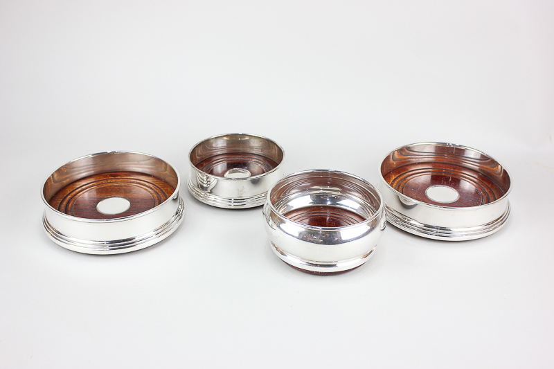 A pair of modern silver coasters with turned wood bases, 13cm, another smaller, 9.5cm, and another - Image 2 of 2