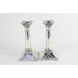 A pair of late Victorian silver column candlesticks, maker Thomas Bradbury & Sons, London 1900, in