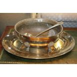 A silver plated oval tureen with lion mask ring handles, raised on cast paw feet, 38cm, a large oval