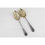 A pair of George III silver gilt berry spoons, maker Solomon Hougham, London 1804, 3.5oz