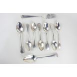 A collection of George III and later silver cutlery to include a dessert spoon, fork, an engraved