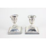 A pair of Edward VII silver dwarf candlesticks, maker Fordham & Faulkner, Sheffield 1904, with