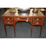 An Edwardian inlaid mahogany desk, with rectangular leather inset top, five drawers and kneehole