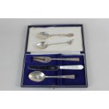 An Elizabeth II silver and mother of pearl cased christening set of knife, fork and spoon, maker