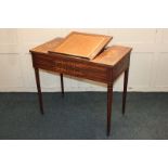 A late Victorian inlaid rosewood lady's writing desk with central leather inset rising slope on a