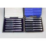 A cased set of six Edward VII Albany pattern silver handled fruit knives, and another cased set of