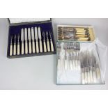Three various sets of six pairs of silver plated dessert knives and forks including one with a
