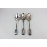 A pair of Victorian silver fiddle pattern basting spoons, maker Chawner & Co, London 1865 (crested),